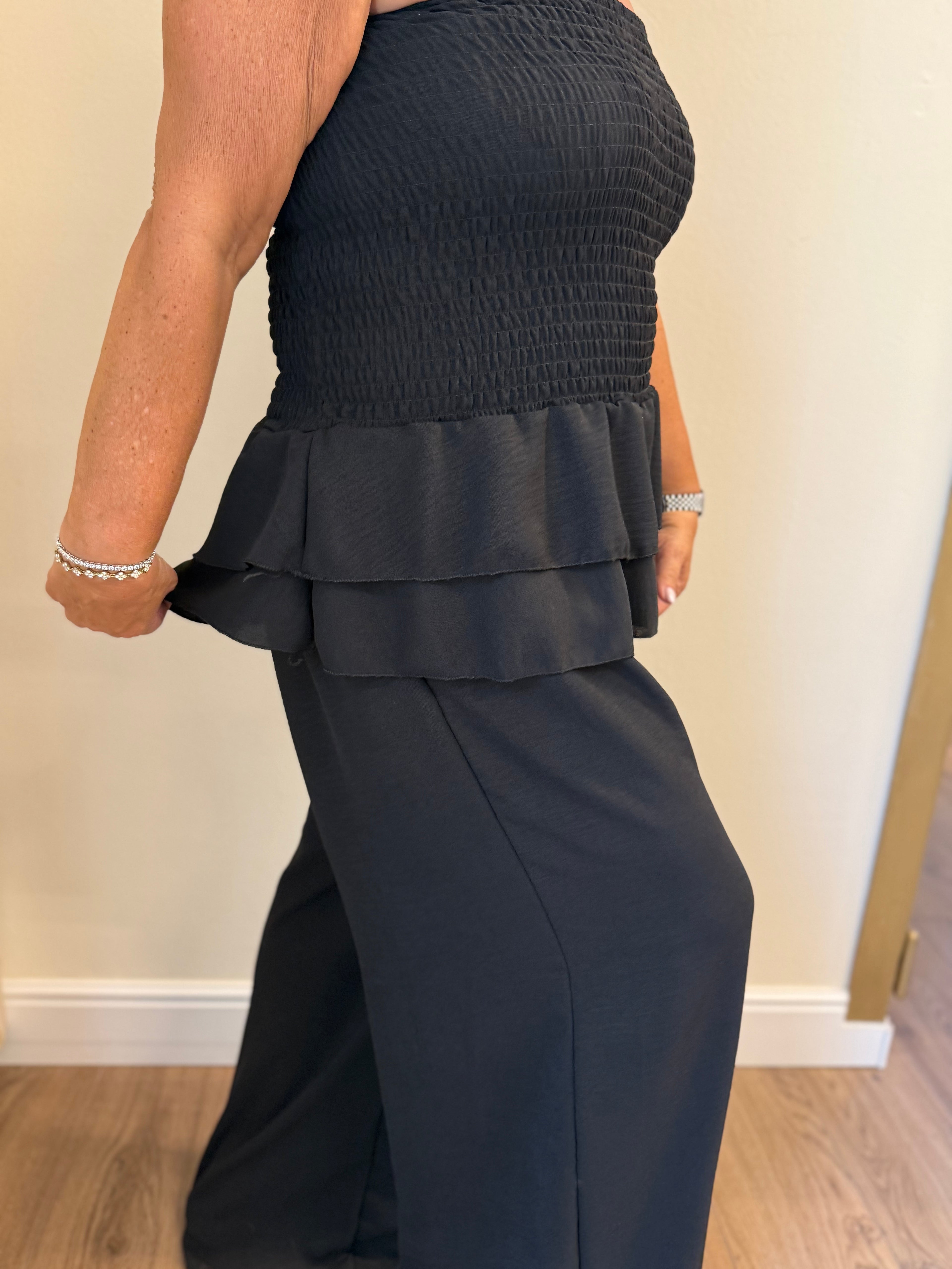 Tuta Chiara con corpetto arricciato e pantalone palazzo